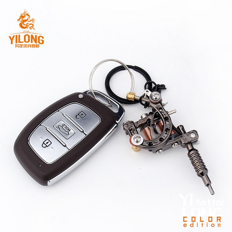 YILONG Fashion Mini Gun Tattoo Machine cool Pendant Toy with Three Color Hot Selling